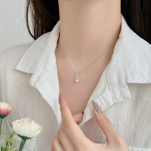 S925 Sterling Silver necklace with geometric zircon pendant shown on female model