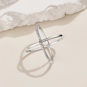 Close-up of S925 sterling silver criss cross ring with sparkling pavé cubic zirconia