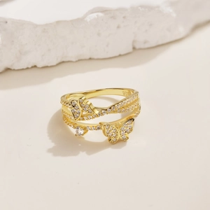 Macro detail of S925 sterling silver butterfly ring with sparkling cubic zirconia inlay