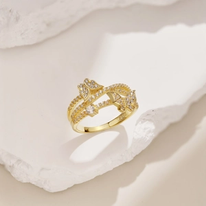 Detailed close-up of golden S925 sterling silver butterfly ring with pave diamond stones