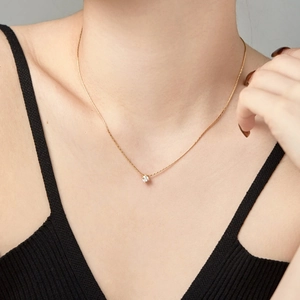 Minimalist gold S925 sterling silver bamboo chain with single zircon pendant on model