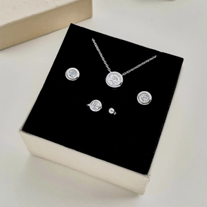 Minimalist S925 sterling silver jewelry set with zircon necklace and earrings in a box