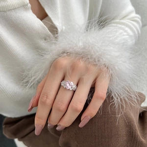 Luxurious S925 silver ring featuring a sparkling heart-shaped pink stone and side diamonds