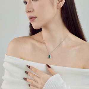 S925 sterling silver necklace with emerald cut pendant and zircon halo on model