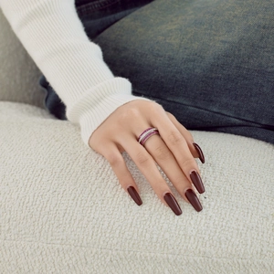 Close-up of S925 sterling silver ring with pink zircon stones and sparkling white diamonds
