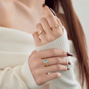 Vintage gold chain ring set with cushion-cut blue pink and clear zircon gemstones