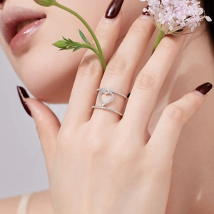 Sparkling S925 sterling silver hollow heart ring with cubic zirconia stones