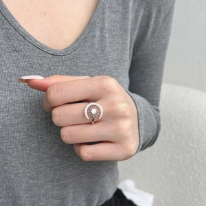 Detail of adjustable S925 silver ring featuring sun and moon design with zircons