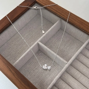Detailed view of S925 sterling silver double heart zircon pendant with adjustable link chain