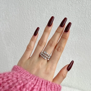 Anello a spirale in argento S925 con zirconi incastonati e una pietra a goccia