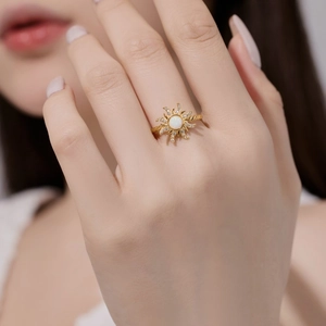 S925 sterling silver gold ring with sun opal and sparkling zircon on woman finger