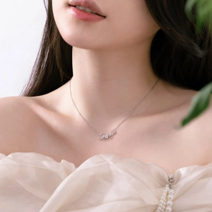 Elegant S925 sterling silver necklace featuring a Love letter pendant with heart-shaped zircon