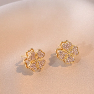 Light luxury gold-plated clover stud earrings with pavé pink purple gemstones