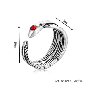 Vintage snake ring with red gemstone and scales pattern in antique silver finish