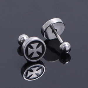 Macro detail of stainless steel barbell stud earrings with Maltese Cross design