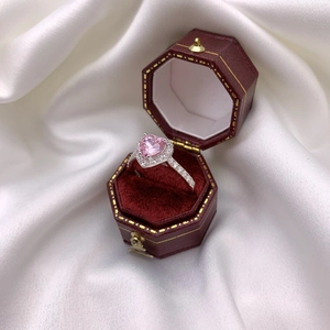 Sparkling S925 silver ring featuring a pink heart-shaped zircon in a velvet jewelry box