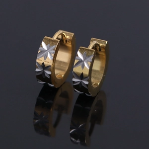 Gold stainless steel hoop earrings with engraved star patterns and silver accents