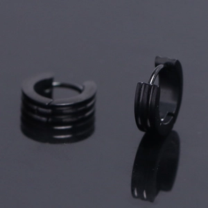 Matte black stainless steel hoop earrings featuring three vertical parallel grooves on band