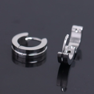 Polished silver stainless steel huggie hoop earrings with minimalist mirror finish