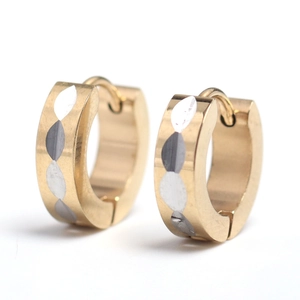 Detail of 4mm stainless steel hoop earrings with gold plating and silver leaf engraving
