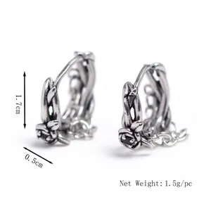 Gothic rose stud earrings in vintage steel with black crystal drop and chain detail