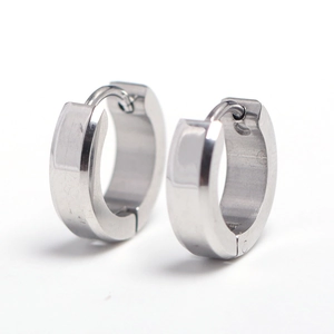 Detailed view of polished silver stainless steel hoop earrings with a square edge design