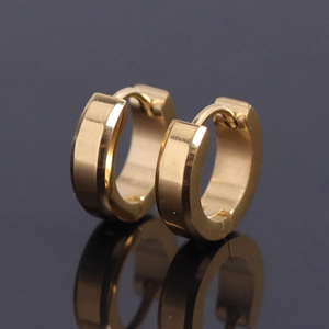 Minimalist 18K gold stainless steel hoop earrings with polished finish on black surface