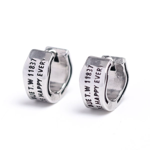 Vintage silver wide band wave earrings with engraved lettering on minimalist metal