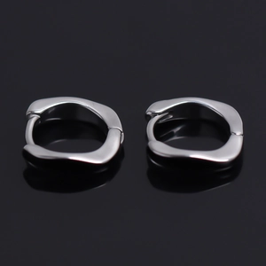Silver minimalist irregular wave hoop earrings with polished metallic finish for men and women