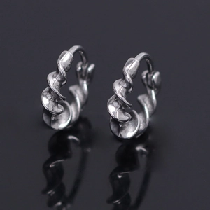 Minimalist silver twist rope earrings with vintage matte finish and sleek reflection