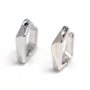 Minimalist silver geometric polygon hoop earrings with modern angular design on white background