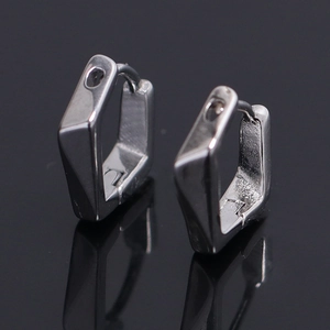 Minimalist silver geometric irregular earrings with hexagonal design and polished finish