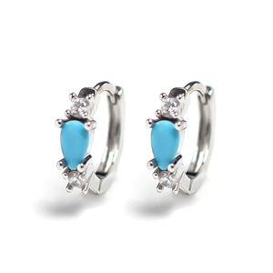 Silver drop earrings featuring turquoise blue stones and sparkling cubic zirconia accents