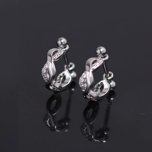 Polished silver infinity knot stud earrings with cubic zirconia and screw-back balls
