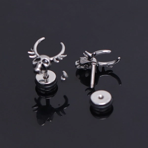 Gothic punk skull stud earrings in antique silver stainless steel with horn design