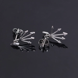 Creative silver stainless steel stud earrings featuring a unique multi-arrow rivet design
