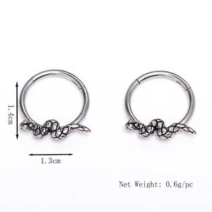 Silver stainless steel snake hoop earring with detailed scale texture on white background