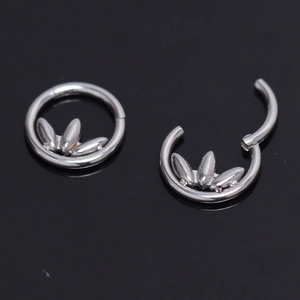 Silver lotus leaf stainless steel hoop earrings shown in open and closed positions