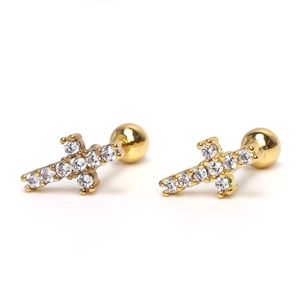 Close-up of gold cross earrings with zircon pavé and secure screw-back ball closure