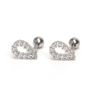Detail of silver U-shaped ear studs with micro-paved white zircons and screw-back balls