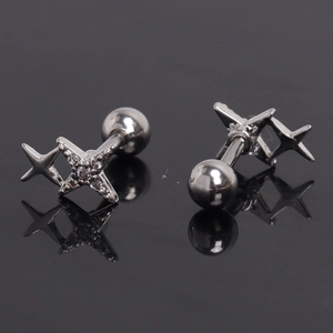 Detailed view of silver star cartilage stud featuring pave zircon and screw ball back