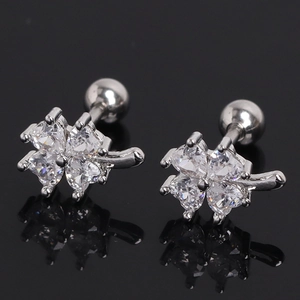 Silver four-leaf clover stud earrings with clear heart zircon and screw-back closure