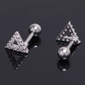 Macro detail of silver triangle stud earrings with paved crystals and screw back closure
