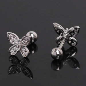 Detail of silver butterfly ear studs with sparkling cubic zirconia and screw ball backs