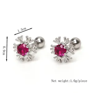 Snowflake stud earrings with red crystal and screw back in silver finish, 1.5cm width