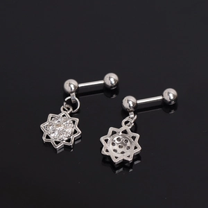 Silver flower stud earrings with white zircons and ball back closure on mirror