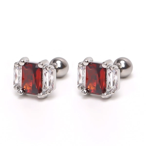 Detail showing square red ruby earrings with white zircon side stones and screw backs