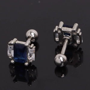 Macro shot of square blue sapphire earrings with cubic zirconia and ball back closure
