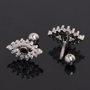 Polished stainless steel evil eye stud earrings with white crystals and black center stone