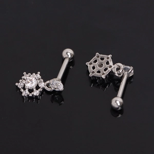 Pair of silver snowflake earrings with zirconia stones and screw ball back closure